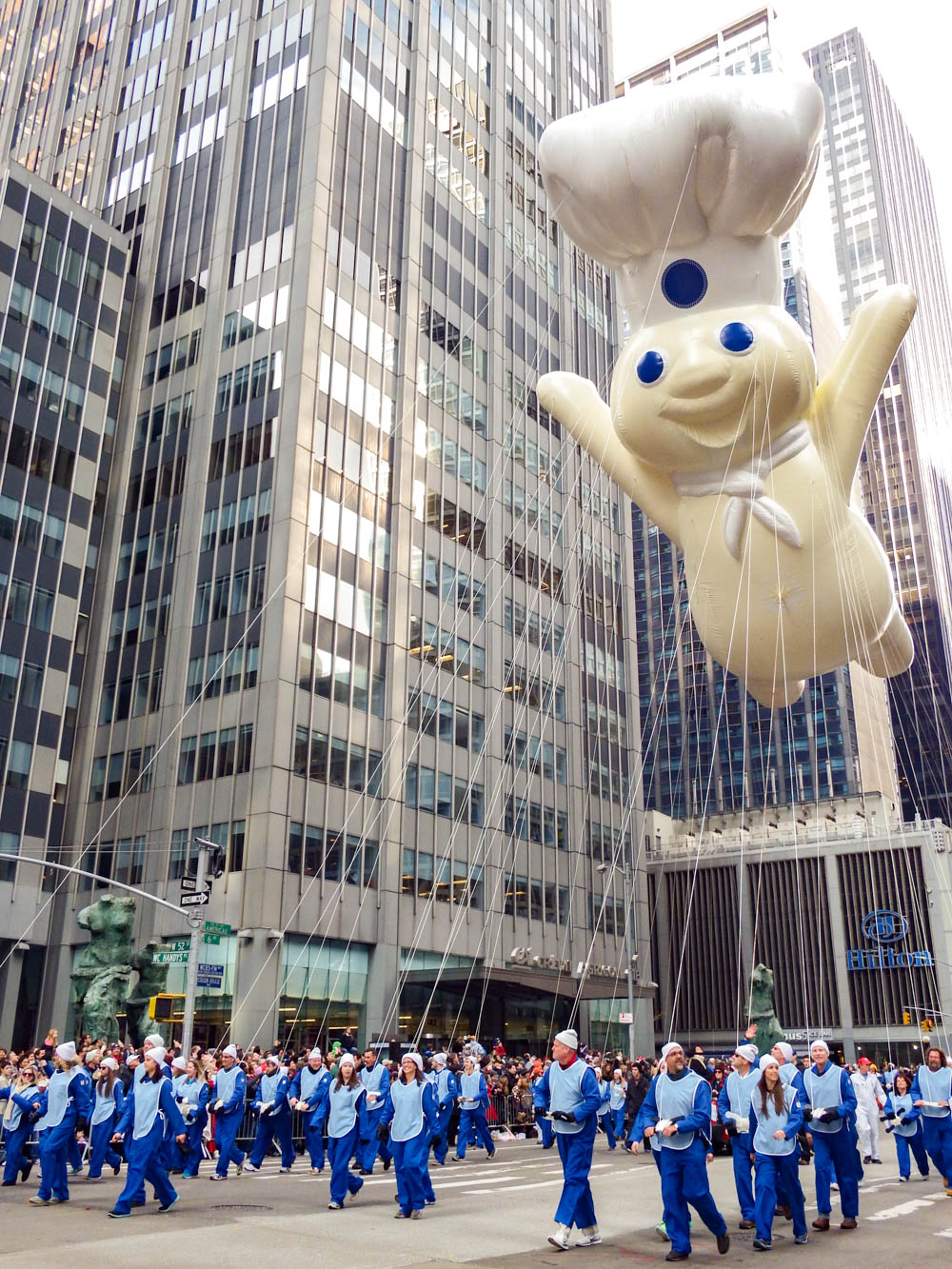 giant pillsbury dough boy balloon at the macys thanksgiving day parade