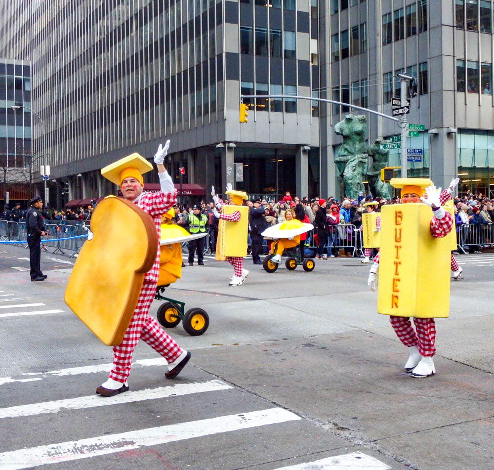 clowns dressed as toast and butter at the macys thanksgiving day parade