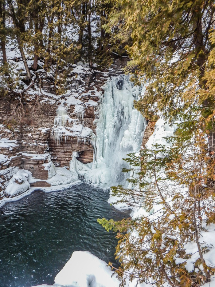 Ice Canyoning in Québec // Why You Should Be All up in This | One of the frozen waterfalls seen while ice canyoning in Québec
