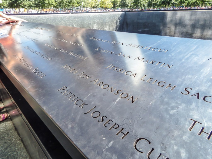 the reflecting pools of the 9/11 Memorial in downtown Manhattan, New York City // remembering September 11th, 2001