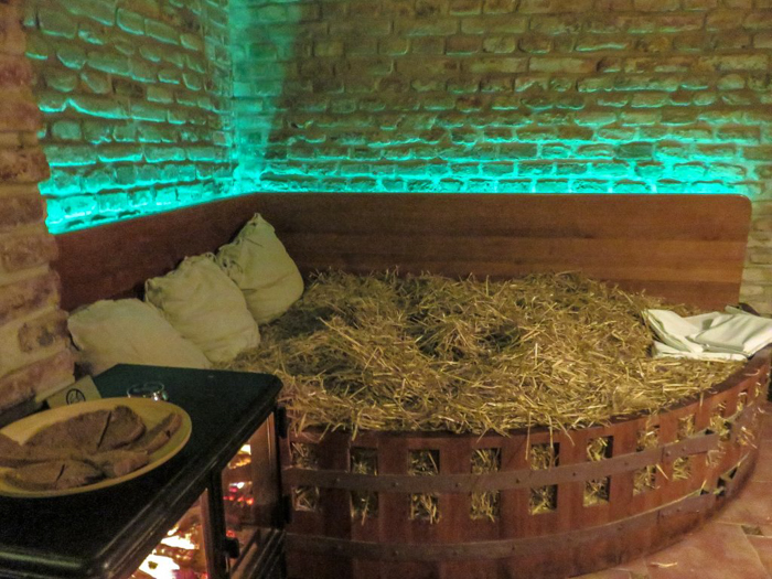 Relaxing wheat straw bed at the Prague beer spa