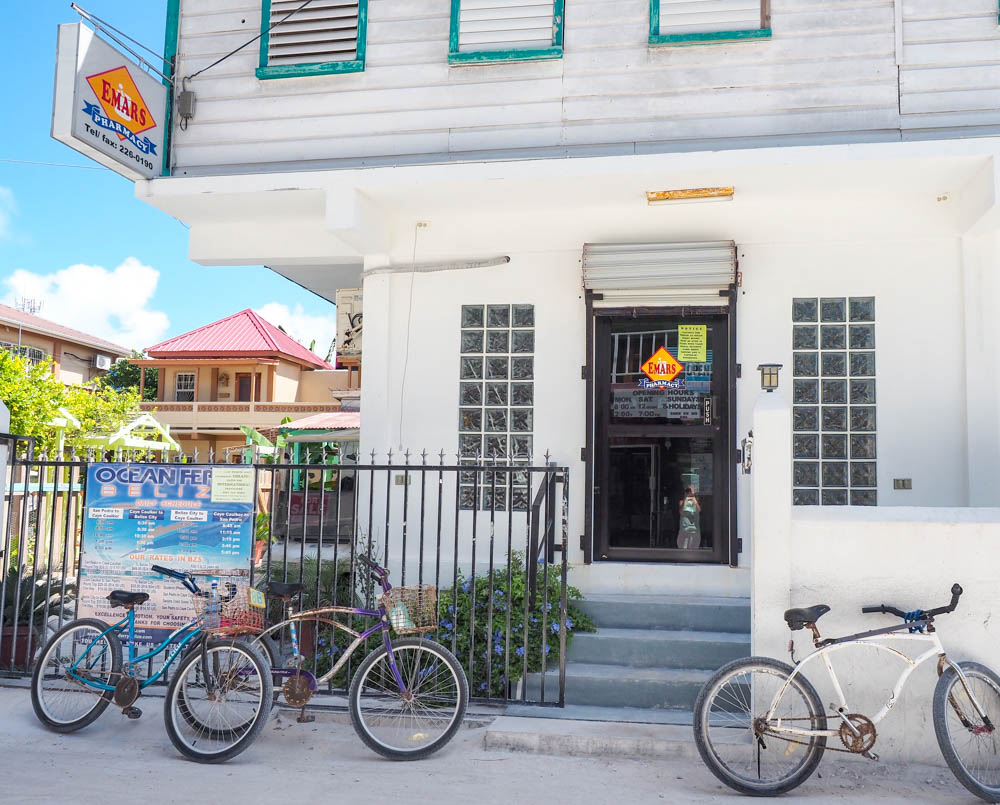 small pharmacy in belize with bikes parked out front