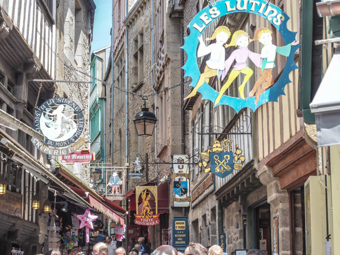 It's actually worth visiting Mont Saint Michel | Normandy, France | Medieval abbey on an island | Bucket list | Disney fairy tale castle inspiration | Mont-St-Michel | main street