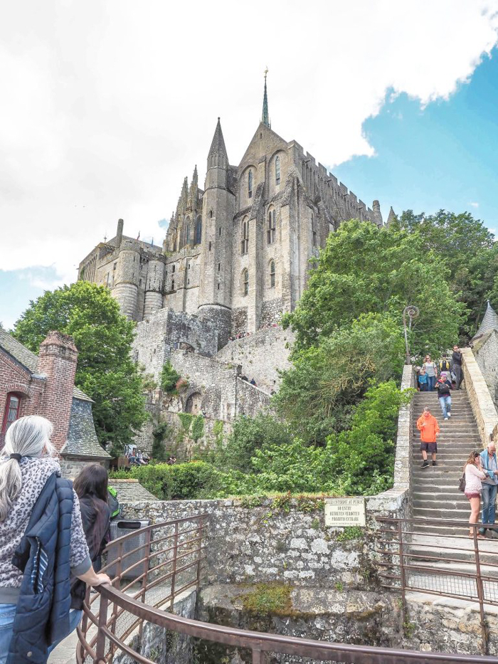 It's actually worth visiting Mont Saint Michel | Normandy, France | Medieval abbey on an island | Bucket list | Disney fairy tale castle inspiration | Mont-St-Michel | stairs