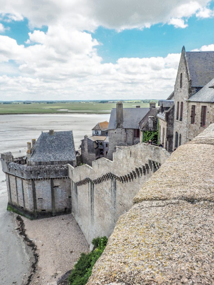 It's actually worth visiting Mont Saint Michel | Normandy, France | Medieval abbey on an island | Bucket list | Disney fairy tale castle inspiration | Mont-St-Michel | wall