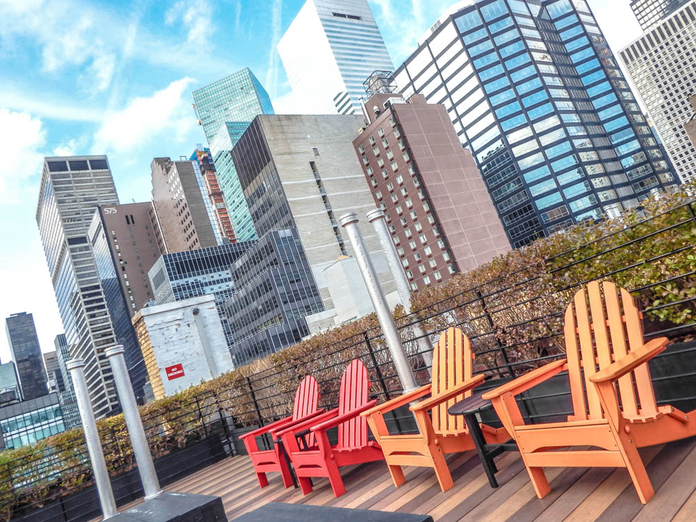 multicolored chairs on a roof in NYC