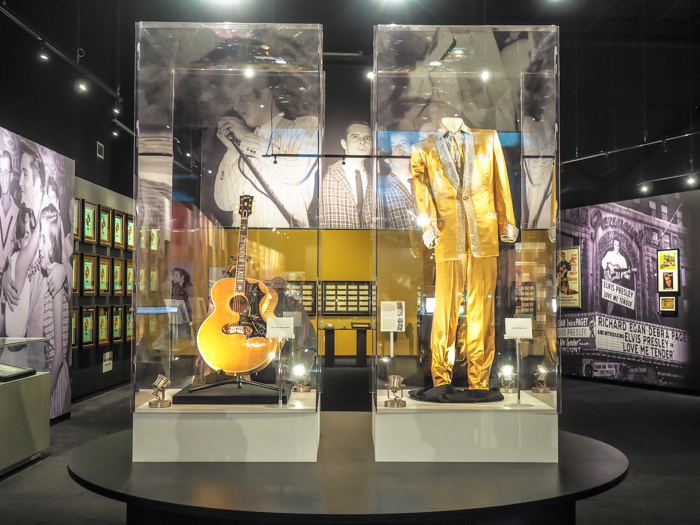 guitar and gold lamé suit | 13 Reasons to Visit Graceland in Memphis, Tennessee even if you're not an Elvis Presley fan #Elvis #Graceland #Memphis #traveltips