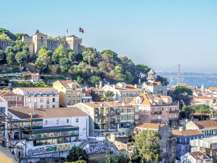 A First-Timer's Guide to Spending 3 Days in Lisbon, Portugal | What to do in Lisbon, what to see in Lisbon | UNESCO World Heritage Sites, museums, where to eat in Lisbon | How to spend 3 days in Lisbon | Castelo de Sao Jorge from Miradouro de nostra senhora do monte #traveltips #lisbon #portugal #timebudgettravel #castle