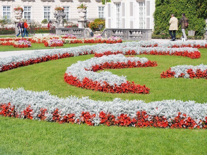 How to Squeeze in a Day Trip to Salzburg from Munich | Austria to Germany | Sound of music, mozart, castle, brewery, museums #salzburg #austria #thesoundofmusic #beer #mozart #daytrip #castle | Mirabell gardens and flowers