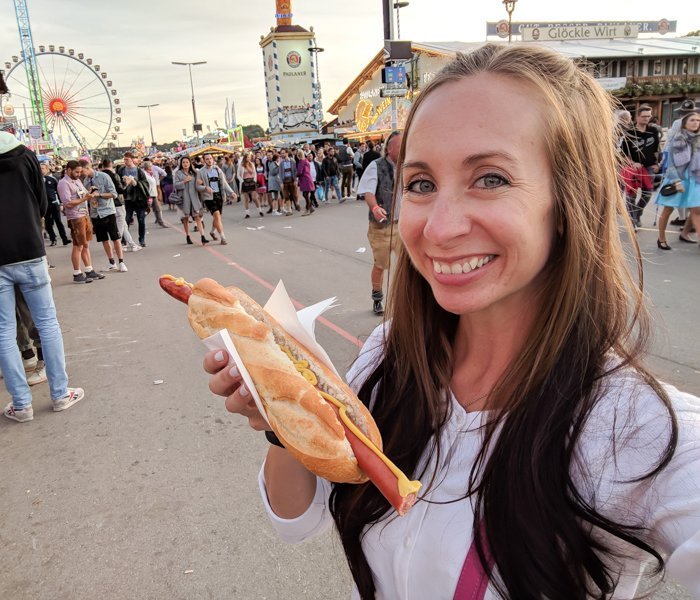 An Oktoberfest Tour Guide's Most Frequently Asked Oktoberfest Questions | Need to know Oktoberfest in Munich, Germany #oktoberfest #munich #germany #beer #festival | Dirndl sweater and bratwurst