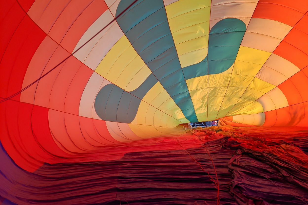 Inside the balloon as they're blowing it up | What You Need to Know for Your Sunrise Hot Air Balloon Ride in Arizona | Scottsdale and Phoenix, Arizona hot air balloon rides with Hot Air Expeditions