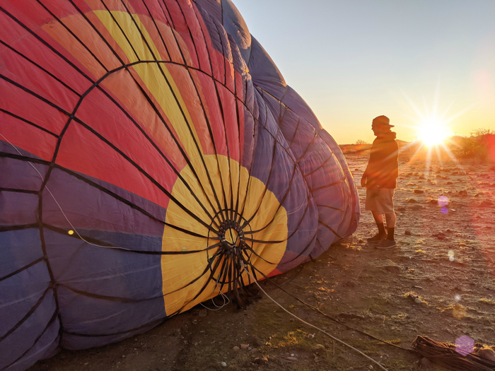 Inflating the balloon at sunrise | What You Need to Know for Your Sunrise Hot Air Balloon Ride in Arizona | Scottsdale and Phoenix, Arizona hot air balloon rides with Hot Air Expeditions 