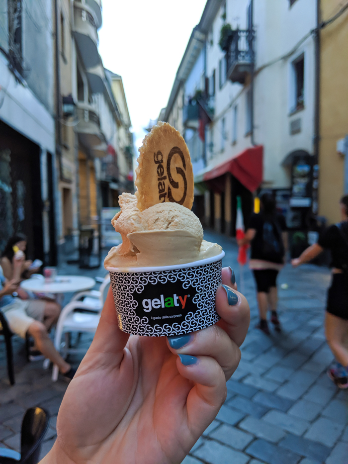 Strolling the streets during Passegiatta, gelato | How to Spend 1 Day in Aosta, Italy // The Capital of the Aosta Valley | Things to see in Aosta, Things to do in Aosta, Where to eat in Aosta, the smallest of Italy's 20 regions #aosta #italy #aostavalley #traveltips #timebudgettravel #romanruins #ancient #ruins #gelato