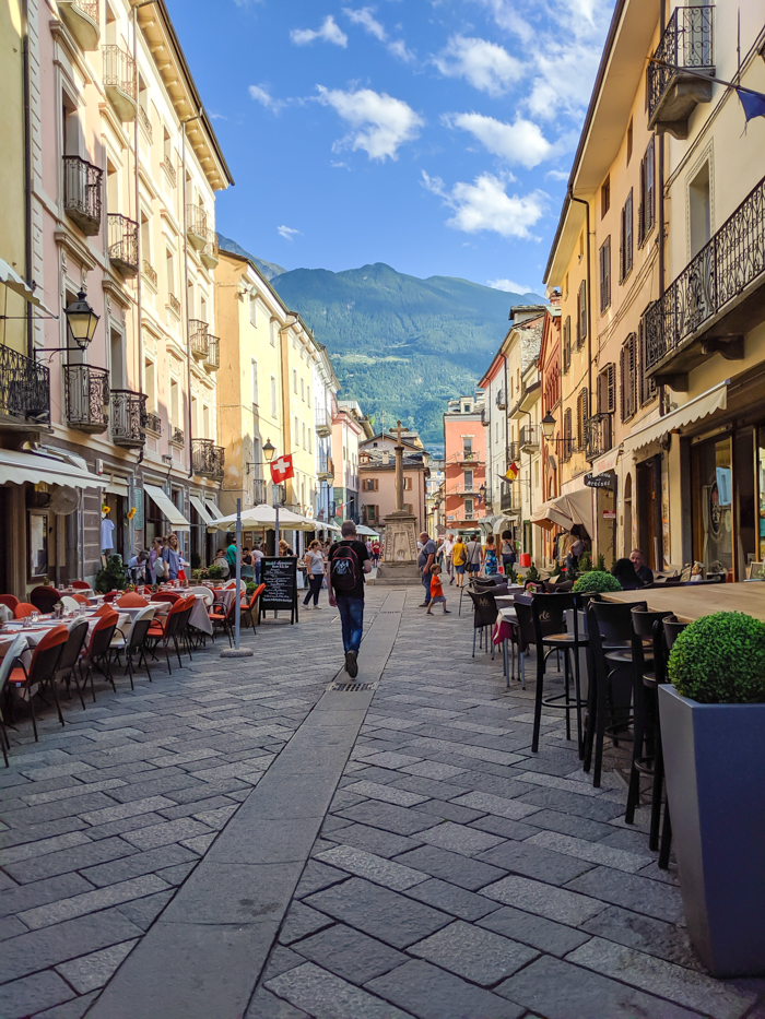 Strolling the streets during Passegiatta | How to Spend 1 Day in Aosta, Italy // The Capital of the Aosta Valley | Things to see in Aosta, Things to do in Aosta, Where to eat in Aosta, the smallest of Italy's 20 regions #aosta #italy #aostavalley #traveltips #timebudgettravel #romanruins #ancient #ruins