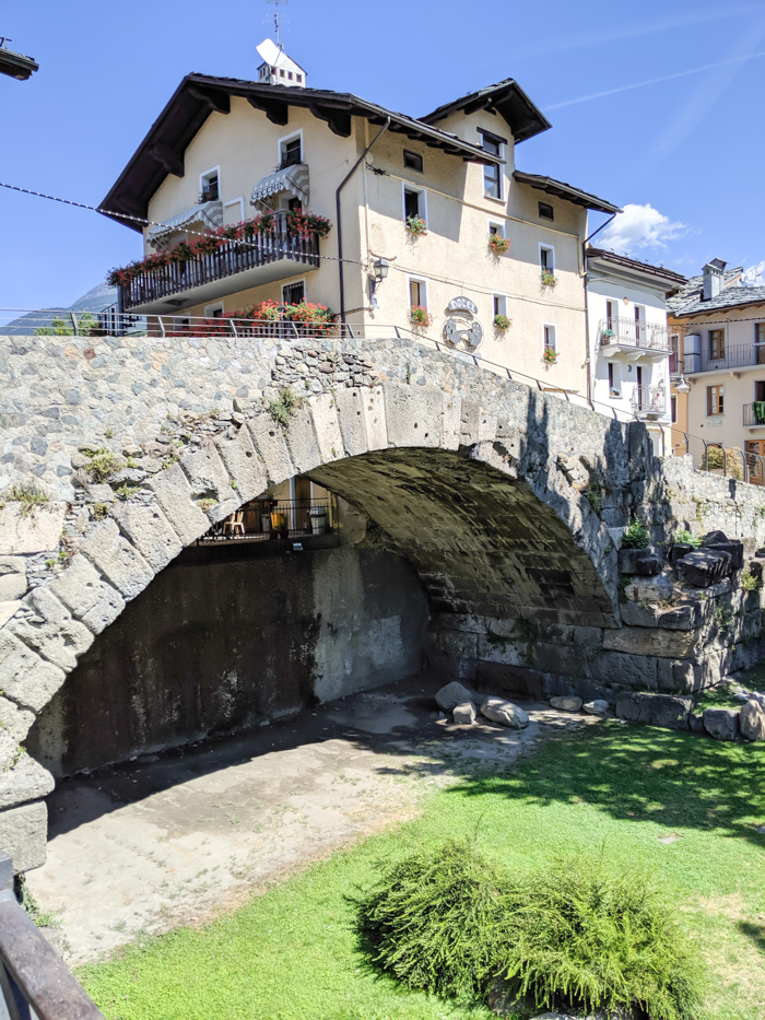 Pont de Pierre, ancient Roman bridge | How to Spend 1 Day in Aosta, Italy // The Capital of the Aosta Valley | Things to see in Aosta, Things to do in Aosta, Where to eat in Aosta, the smallest of Italy's 20 regions #aosta #italy #aostavalley #traveltips #timebudgettravel #romanruins #ancient #ruins