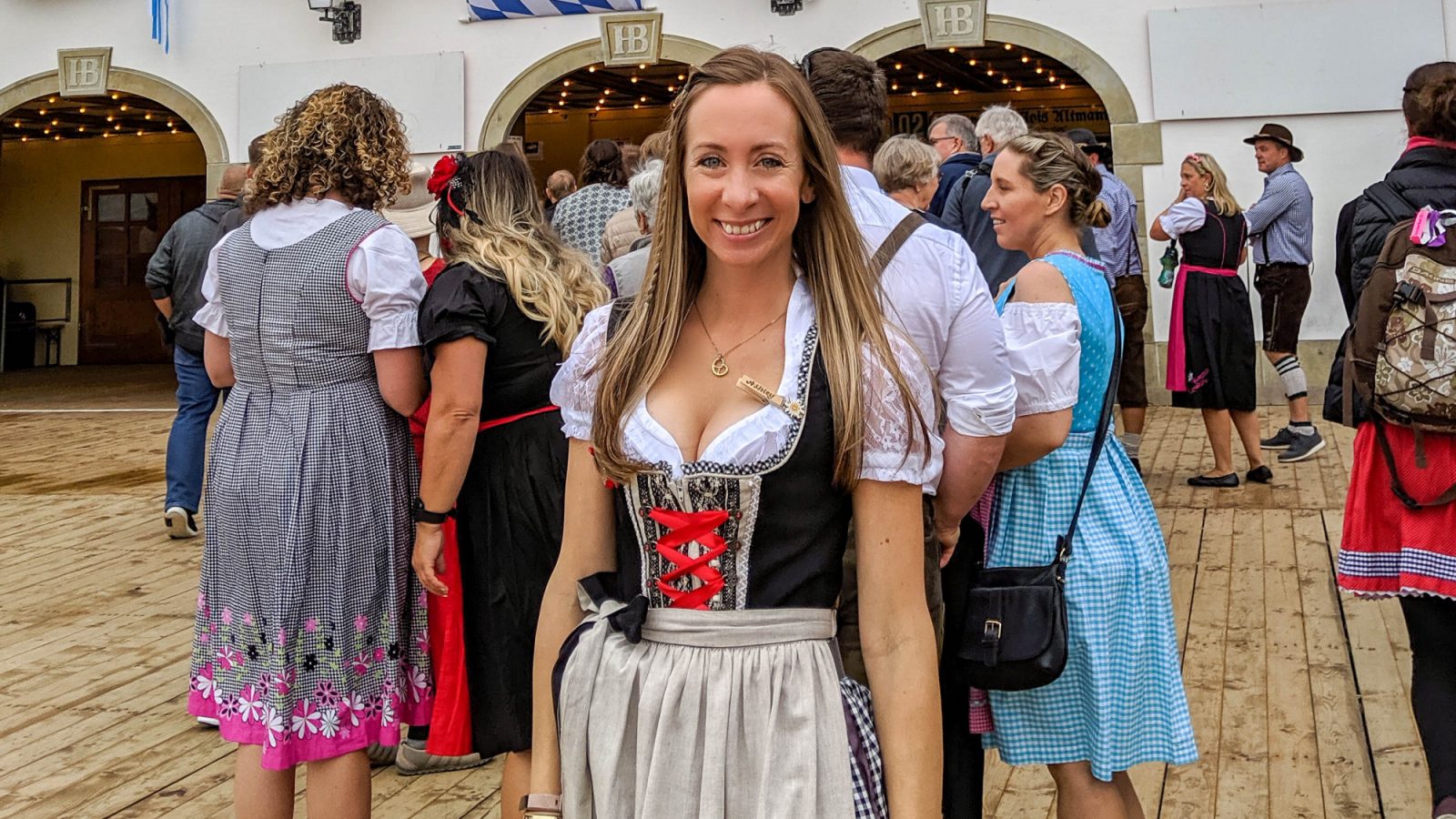 me in a dirndl outside an oktoberfest beer tent