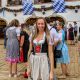 me in a dirndl outside an oktoberfest beer tent