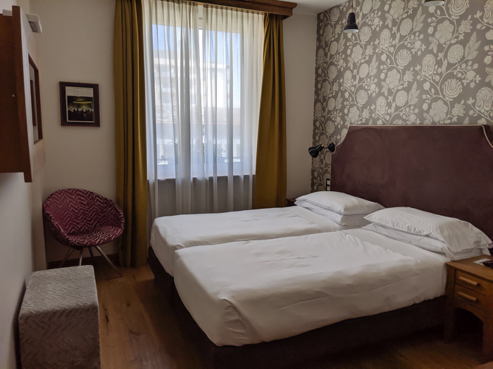 Where to stay in Aosta - the Duca D'Aosta Hotel, bedroom | How to Spend 1 Day in Aosta, Italy // The Capital of the Aosta Valley | Things to see in Aosta, Things to do in Aosta, Where to eat in Aosta, the smallest of Italy's 20 regions #aosta #italy #aostavalley #traveltips #timebudgettravel