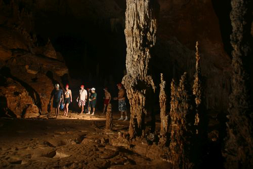 People touring the ATM Cave / What to pack for the ATM Cave in Belize: What to wear, what shoes to wear, what to bring, and what to never, ever bring into the ATM Cave.