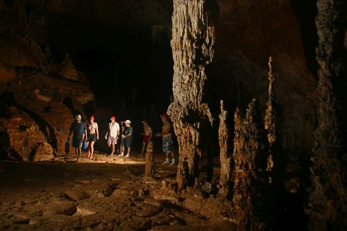 People touring the ATM Cave / What to pack for the ATM Cave in Belize: What to wear, what shoes to wear, what to bring, and what to never, ever bring into the ATM Cave. 