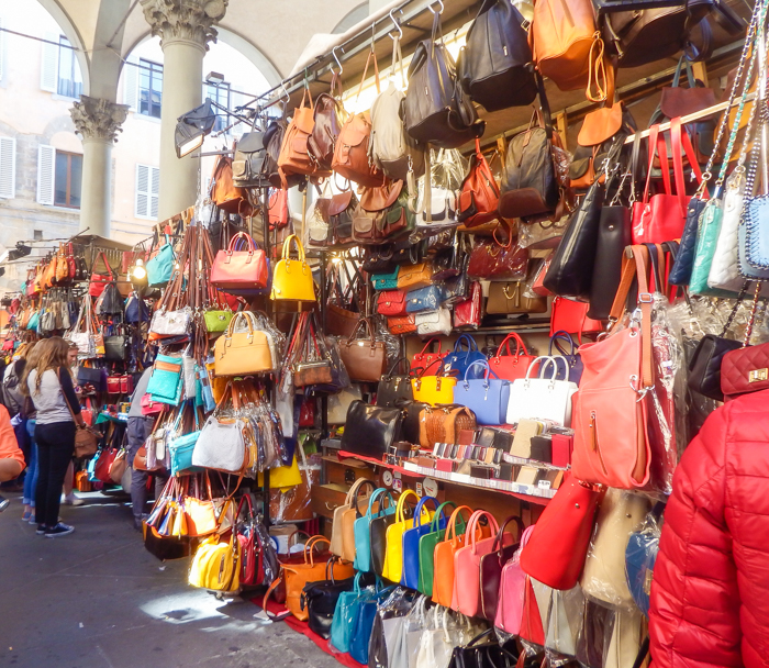 Shopping for leather purses at Mercato Porcellino, the new market, the straw market, mercato nuovo / 2 days in Florence, Italy