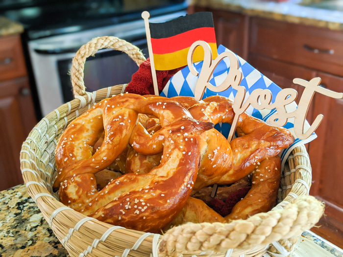 bavarian pretzels in a basket with a german flag