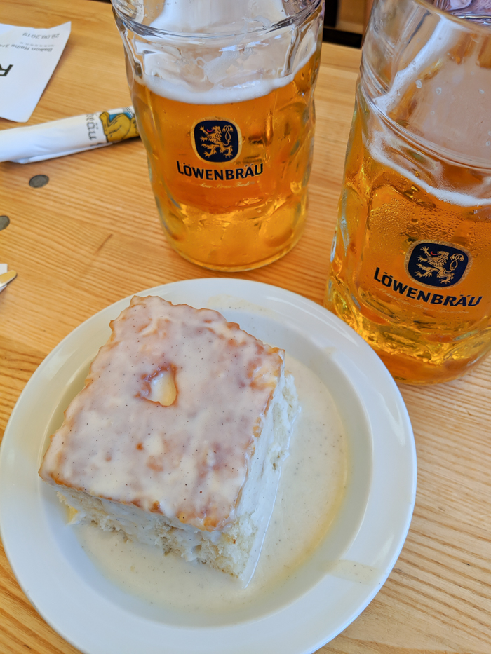 Plate of dampfnudel and Lowenbrau beer at Oktoberfest
