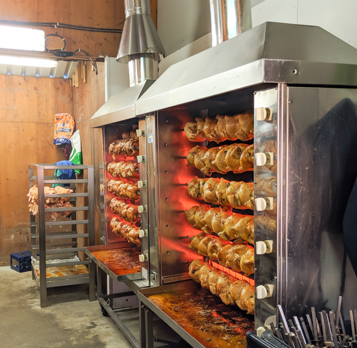 oktoberfest party foods for your oktoberfest-themed party: rotisserie chickens in the lowenbrau beer tent