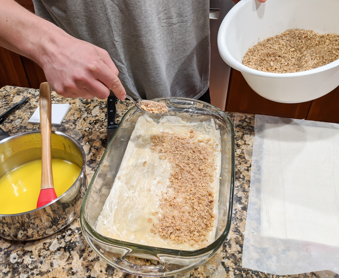 Adding nut mixture to this simple honey walnut baklava recipe