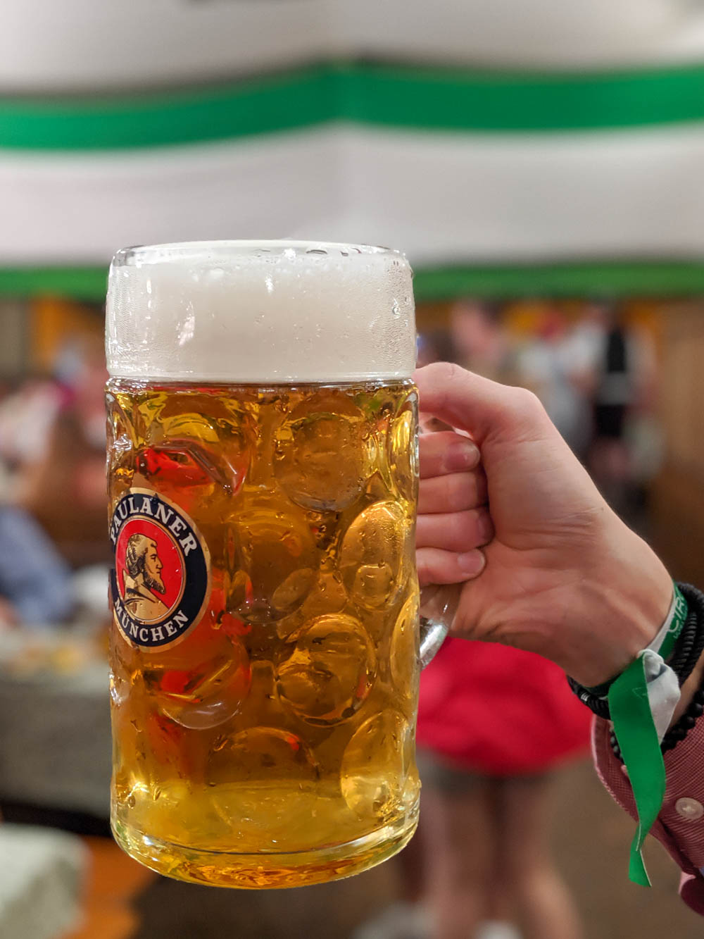 Oktoberfest party beer: What kind of beer to serve at your oktoberfest party | Paulaner mass at Oktoberfest in Munich, Germany inside the Armbrustschutzenzelt