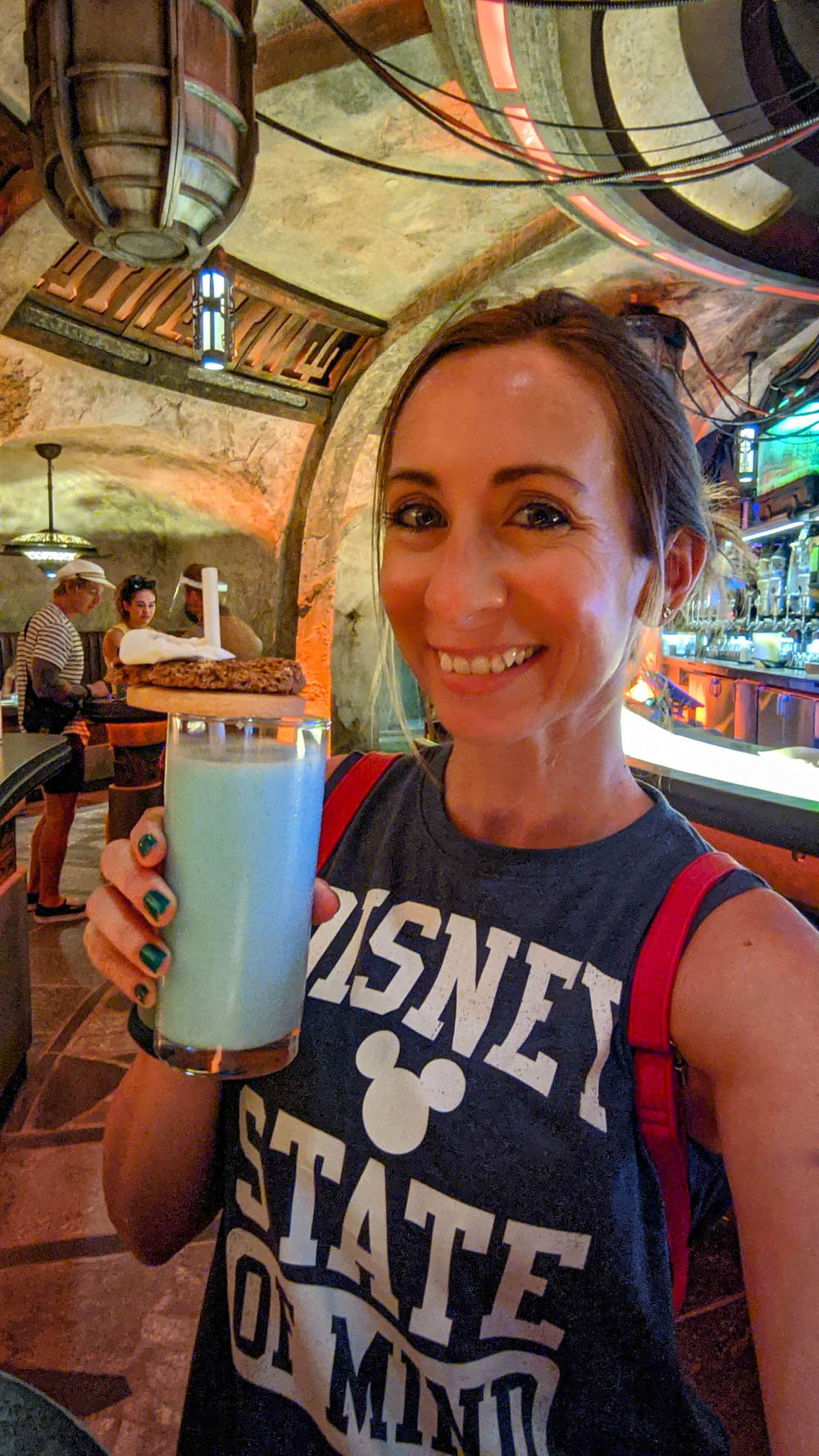 Visiting Disney World During the Pandemic: Everything You’re Dying to Know | Disney World in 2020, what it's like to visit disney world right now. | drinking blue milk at Oga's Cantina in Star Wars: Galaxy's Edge at Hollywood Studios