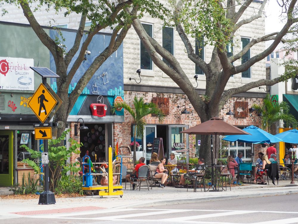 store fronts and large trees in st pete florida