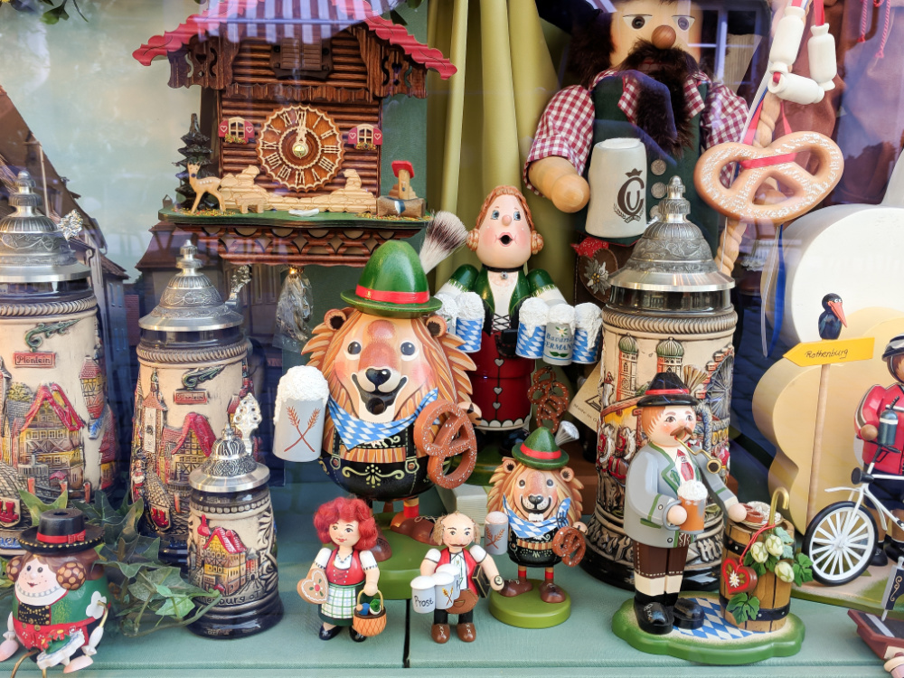 Collection of German trinkets and incense smokers in a shop window in Rothenburg