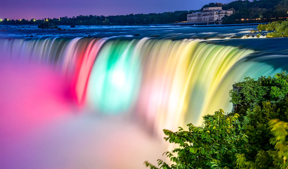 7 of the best niagara falls tours from new york: Niagara Falls lit up at night