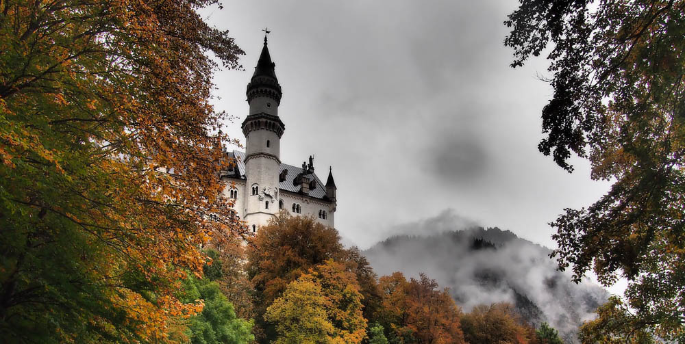 Neuschwanstein Castle in the fall | Where to stay near Neuschwanstein Castle: 12 Best Hotels and Airbnbs in Hohenschwangau, Schwangau, and Füssen