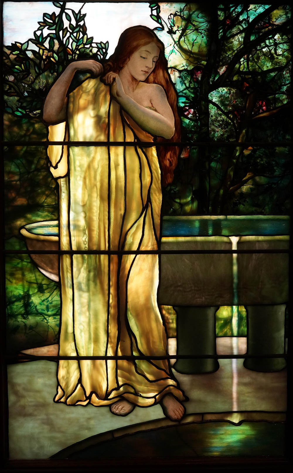 stained glass window of female figure - things to do in orlando besides theme parks