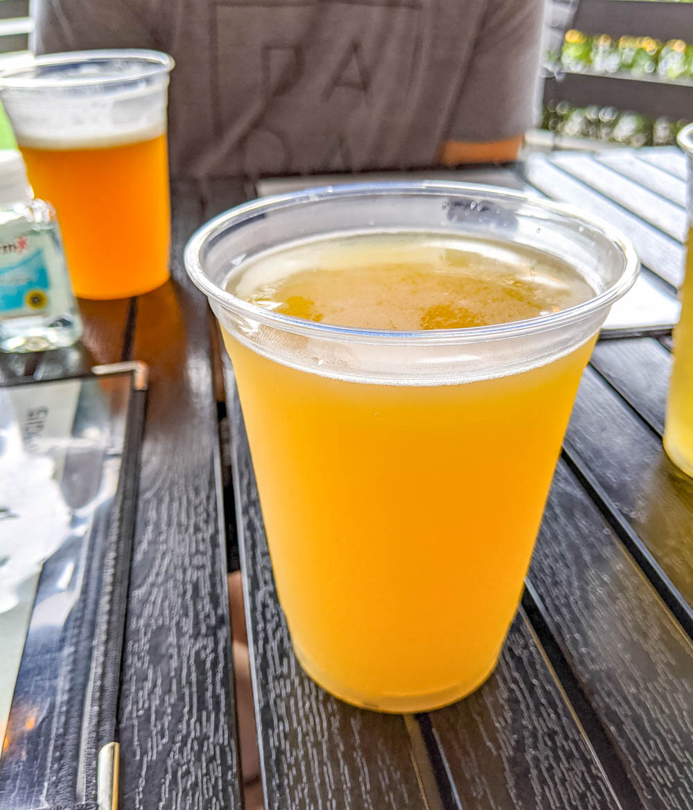 hazy beers on a patio | Awesome breweries in palm beach county, florida | craft beer and cider in west palm beach