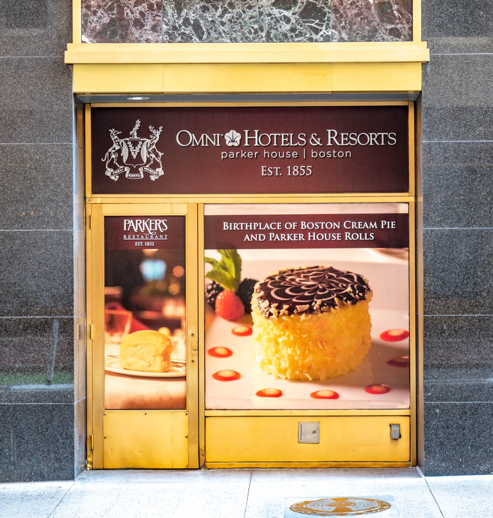 advertisement for boston cream pie on outside of omni parker house hotel