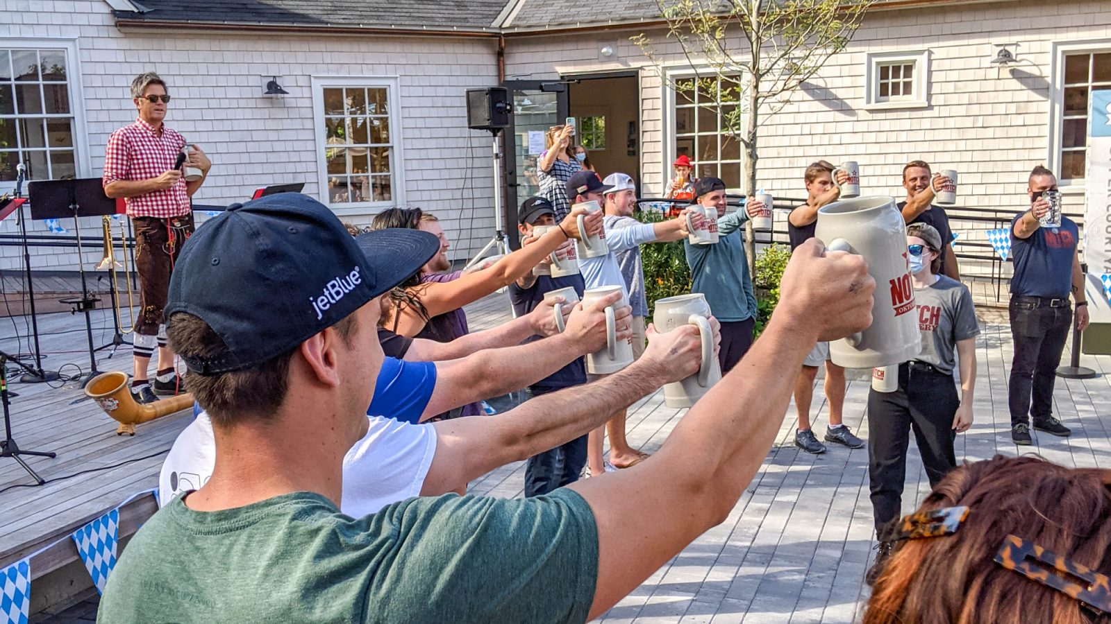 Best Oktoberfest Games for Fun & Hilarious Backyard Bierfests | Games like Hammerschlagen, Masskrugstemmen, pretzel-eating contests, stein-carrying races, board games, and more