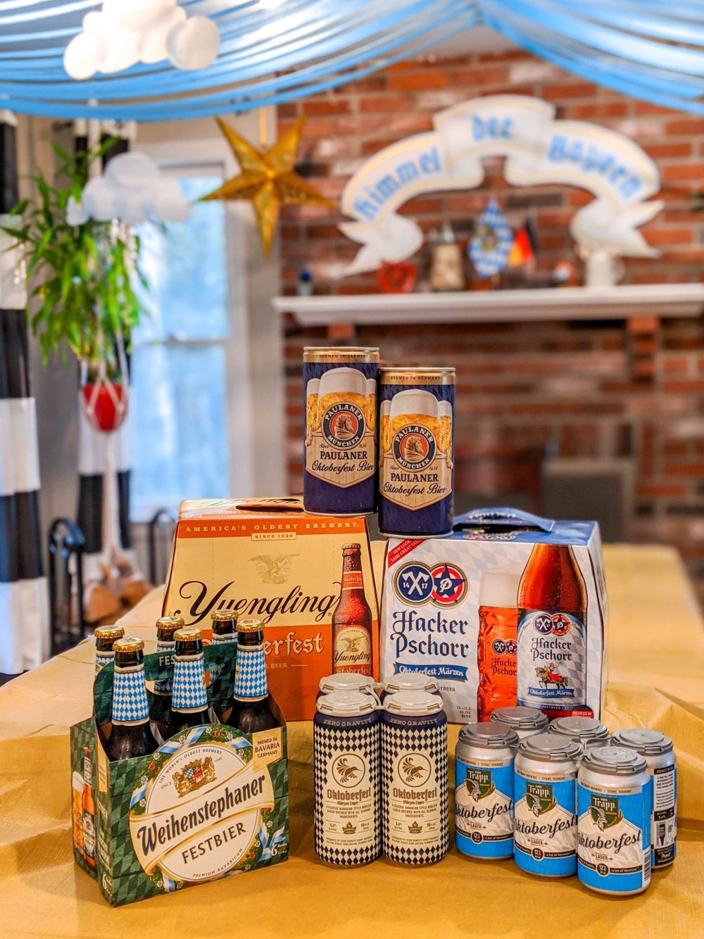 oktoberfest-style beers stacked up on a kitchen table
