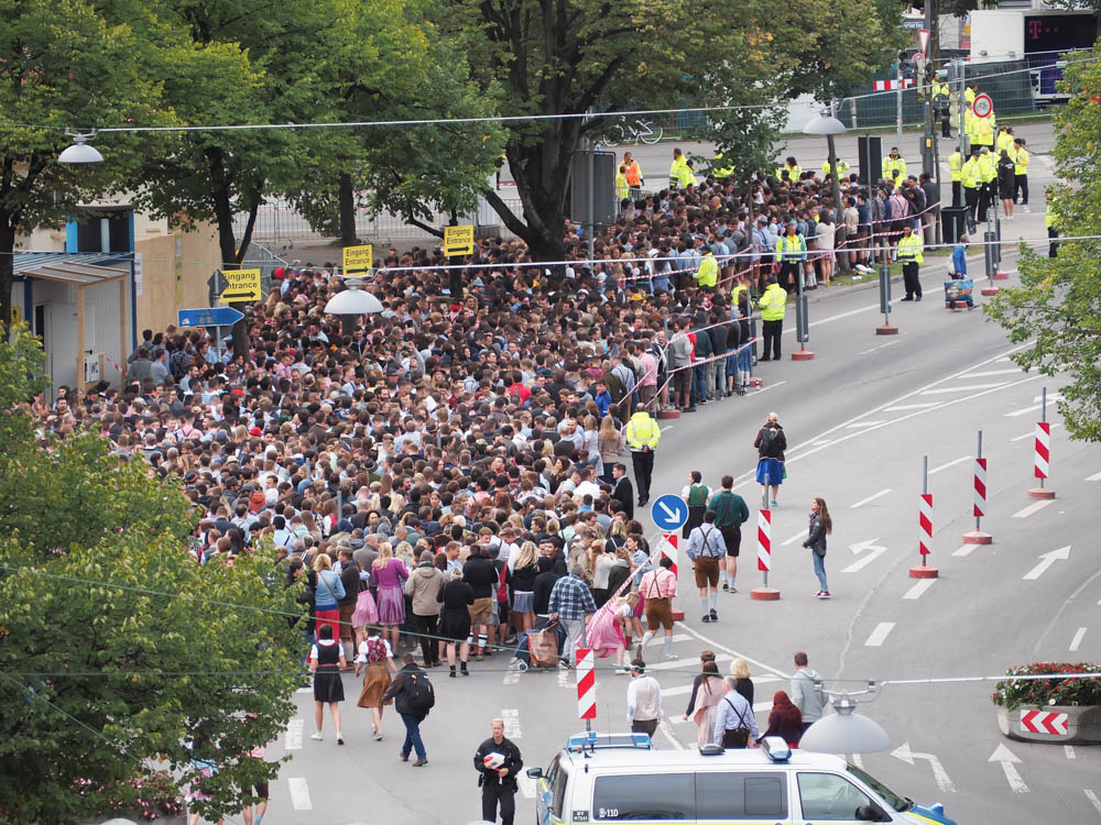 crowds of thousands of people outside oktoberfest grounds
