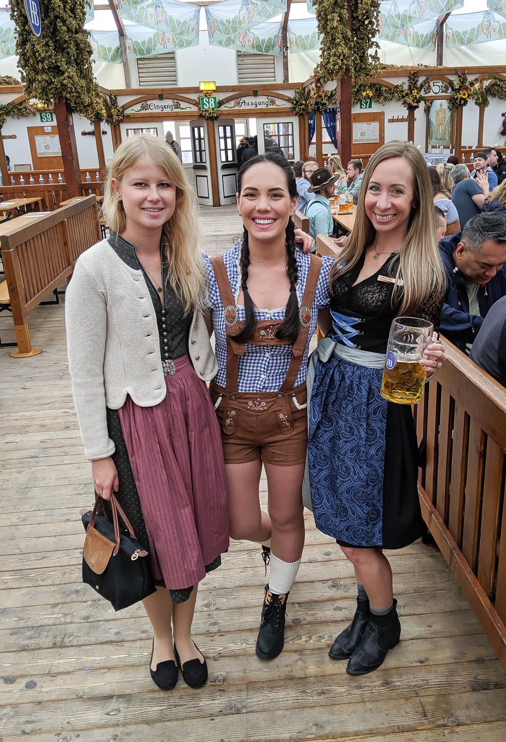 three women wearing three different types of oktoberfest shoes