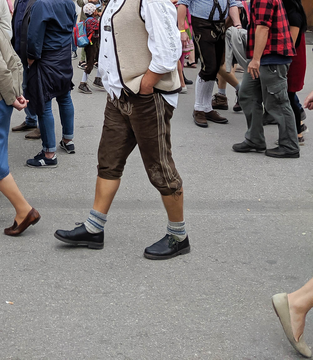 men wearing different kinds of oktoberfest shoes and socks