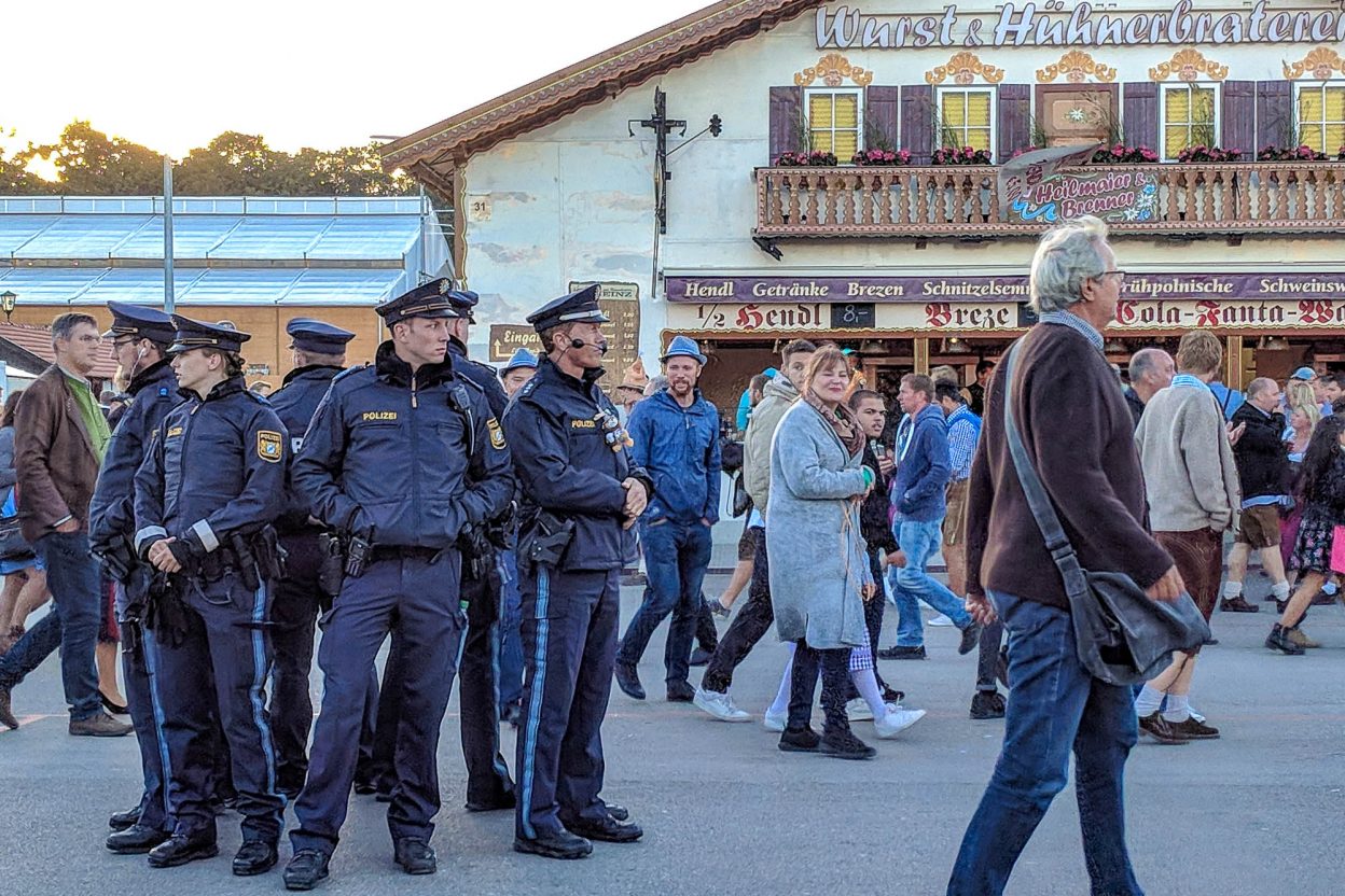 oktoberfest police squad hanging out outside a beer tent