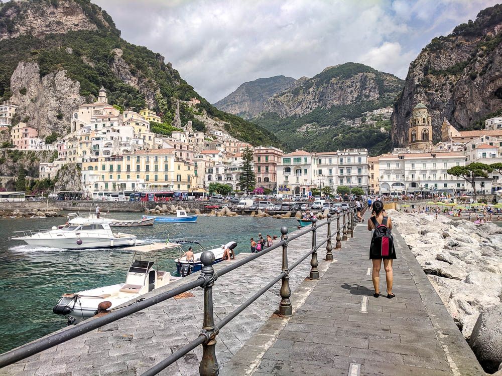 the coast of Amalfi with all the buildings and boats