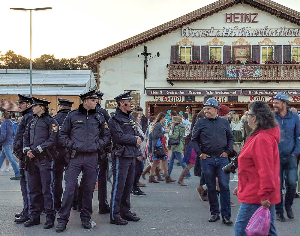 group of police standing outside and oktoberfest beer tent