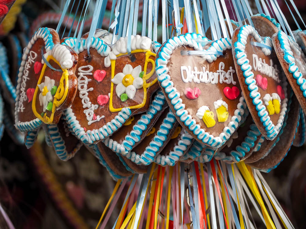 hanging decorated cookies that say Oktoberfest on them