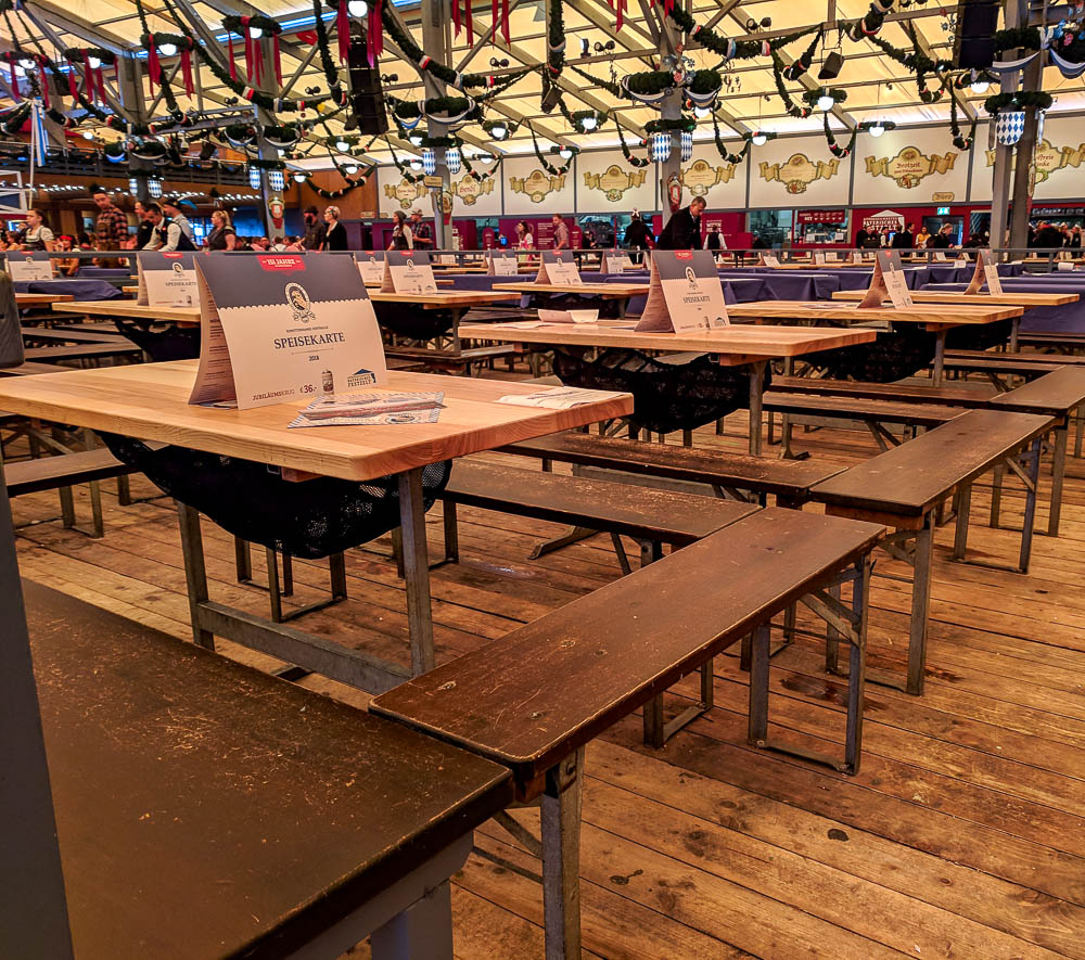 tables inside a beer tent showing a net underneath