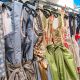 racks of beautiful dirndls in a trachten pop up shop in munich during oktoberfest