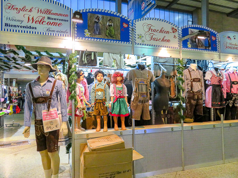 racks of cheap trachten at the train station in munich during oktoberfest